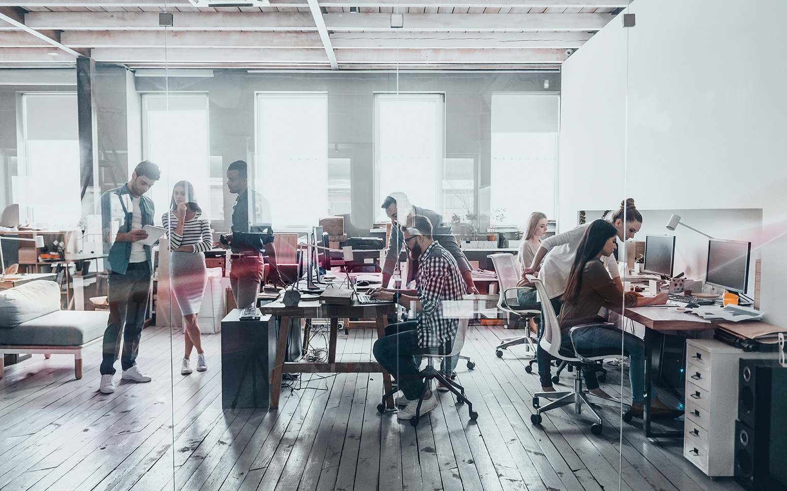 Retail teams in a giant, open warehouse.